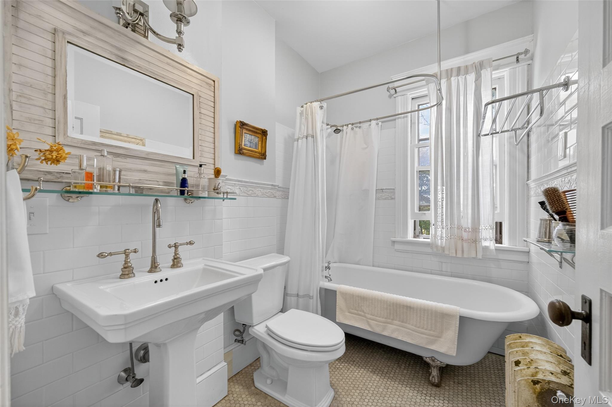 111 South Hamilton Street Poughkeepsie, NY 12601 - Photo 29 of 46 a bathroom with a sink toilet a mirror and bathtub