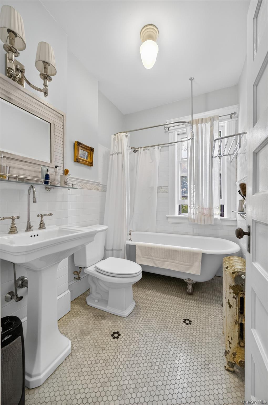 111 South Hamilton Street Poughkeepsie, NY 12601 - Photo 30 of 46 a bathroom with a sink toilet and shower