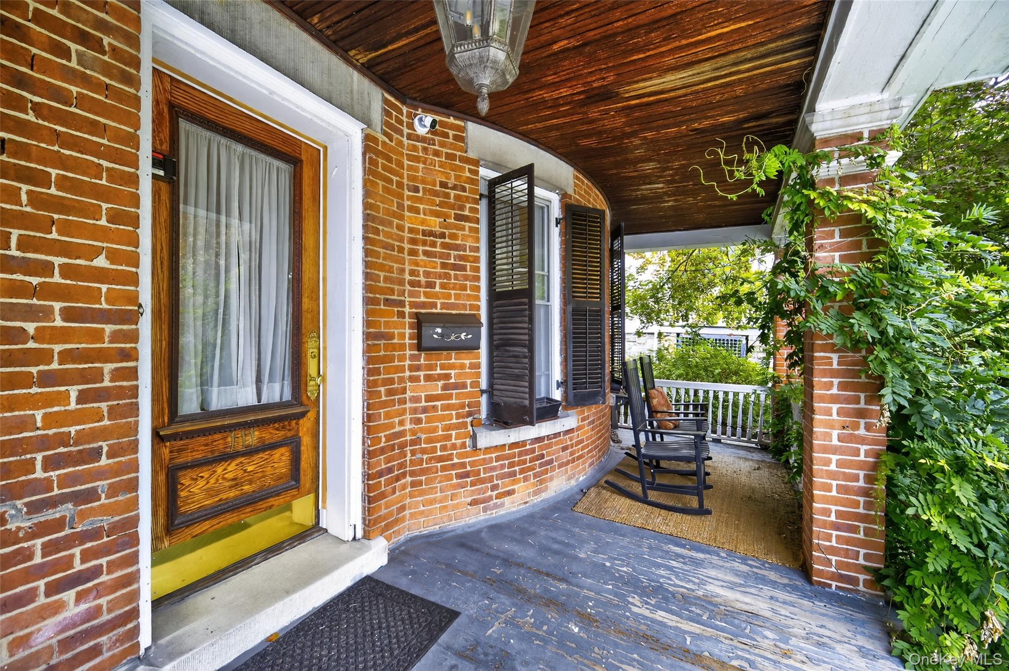 111 South Hamilton Street Poughkeepsie, NY 12601 - Photo 3 of 46 a view of chair in the balcony with wooden floor