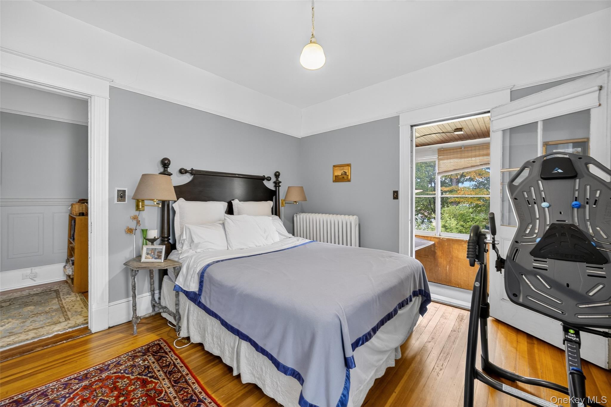 111 South Hamilton Street Poughkeepsie, NY 12601 - Photo 33 of 46 a bedroom with a bed and wooden floor