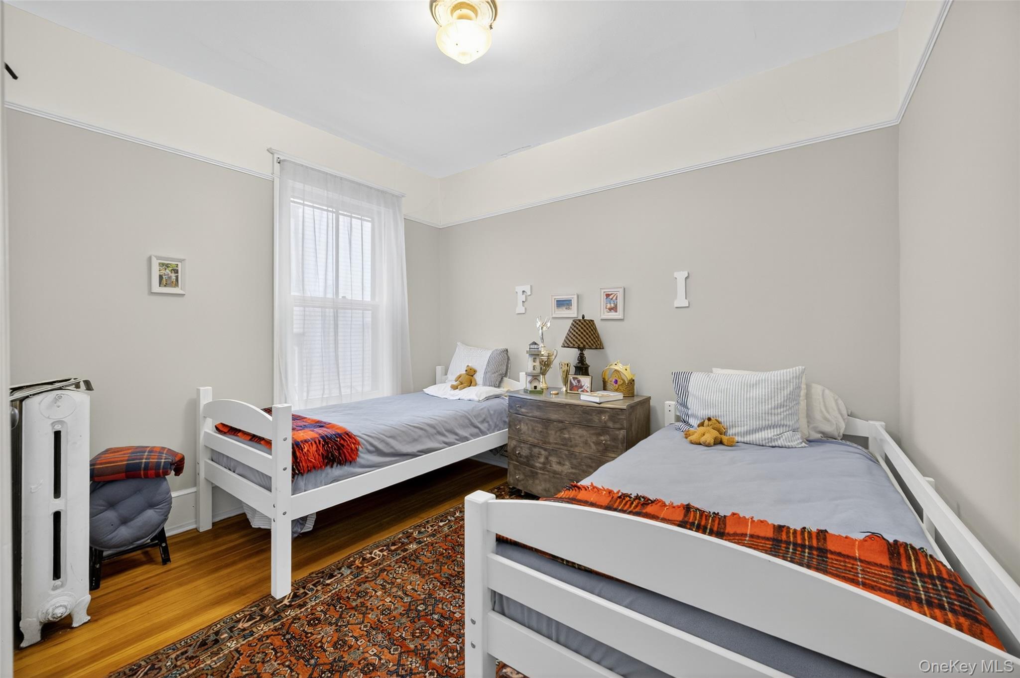 111 South Hamilton Street Poughkeepsie, NY 12601 - Photo 34 of 46 a bed room with furniture and window