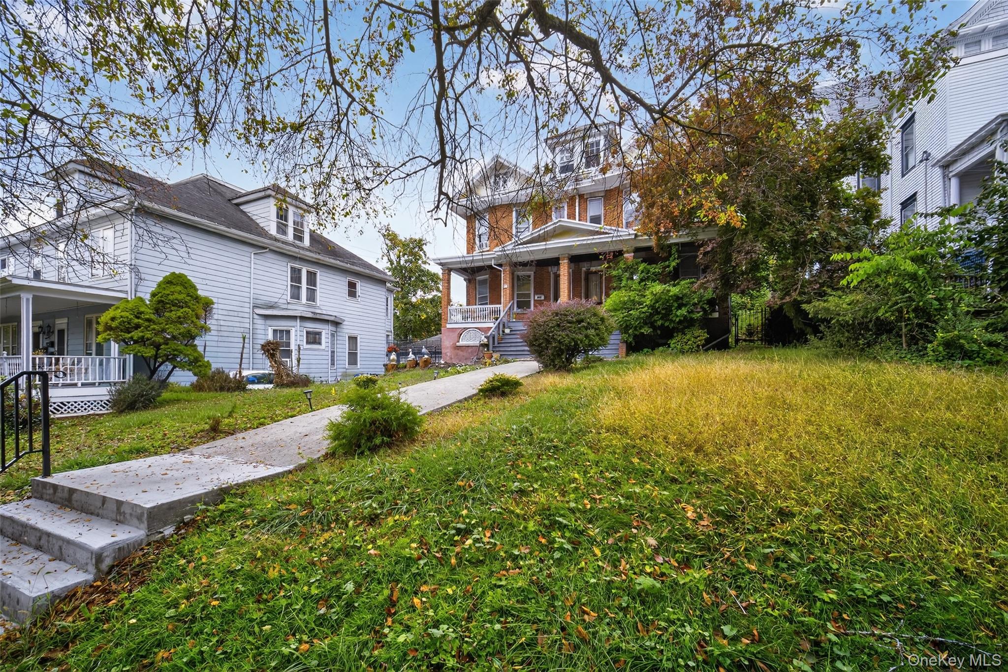 111 South Hamilton Street Poughkeepsie, NY 12601 - Photo 46 of 46 a view of a house with garden and a tree