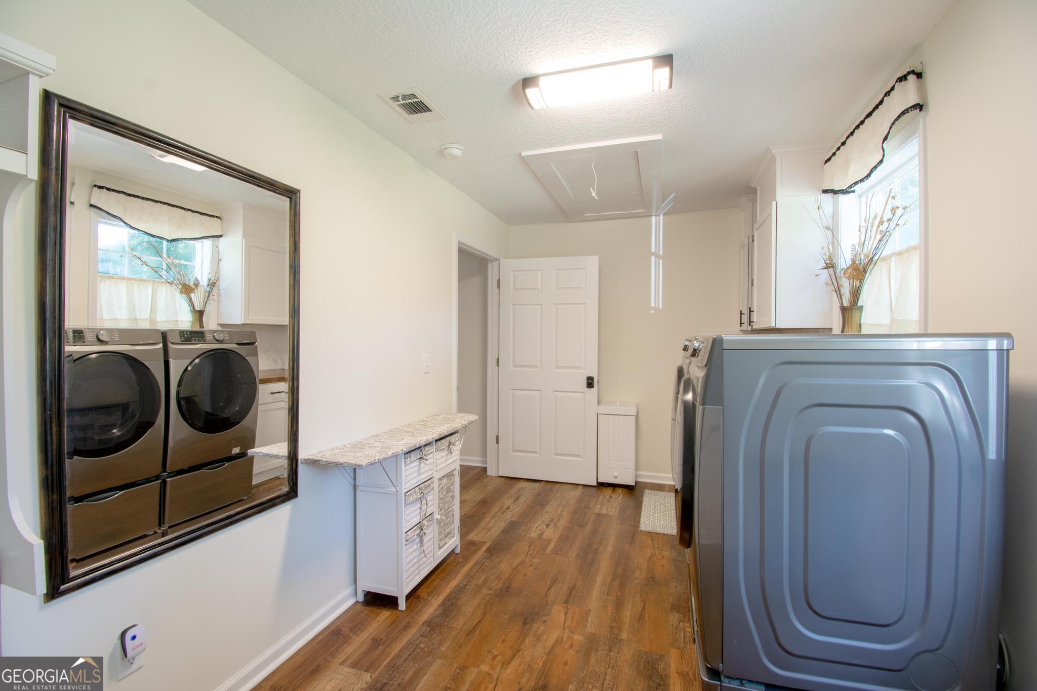 149 Main Street Rocky Ford, GA 30455 - Photo 15 of 44 a view of a storage and utility room with wooden floor