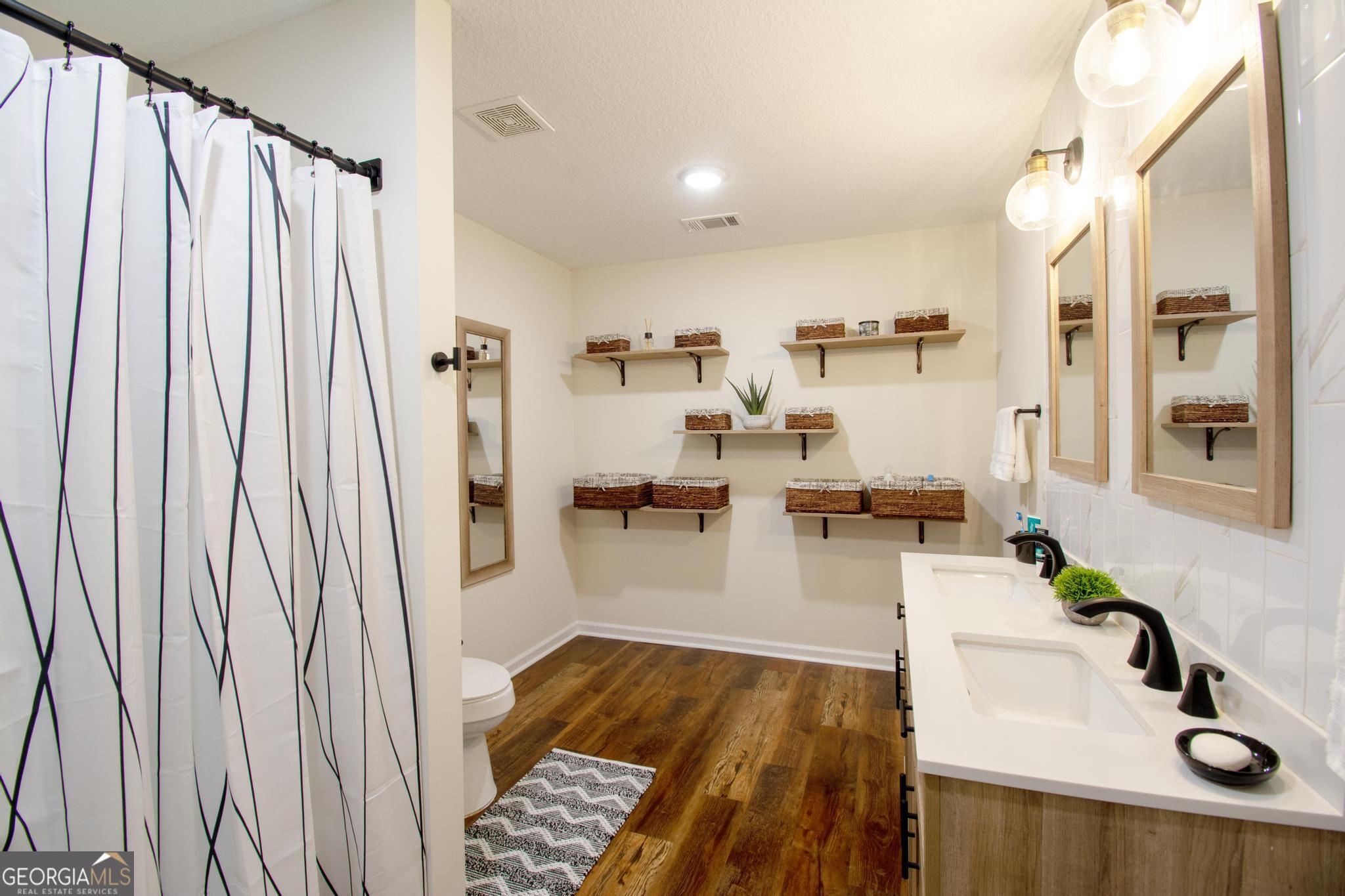 149 Main Street Rocky Ford, GA 30455 - Photo 23 of 44 a living room with furniture and a table