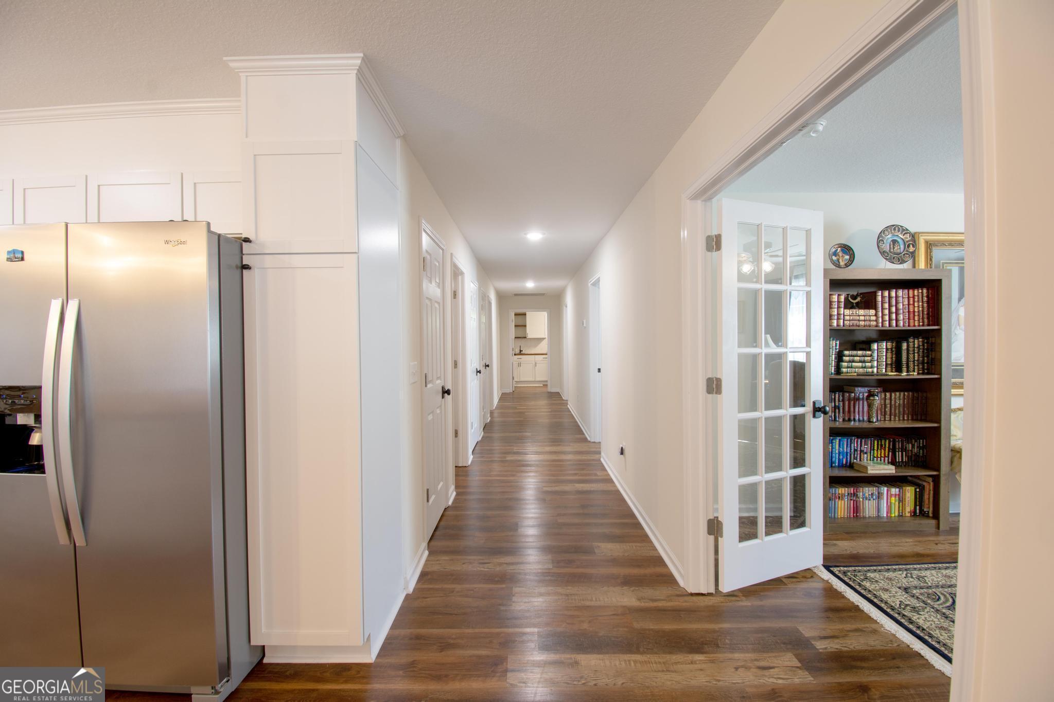 149 Main Street Rocky Ford, GA 30455 - Photo 29 of 44 a view of a hallway with wooden shelves