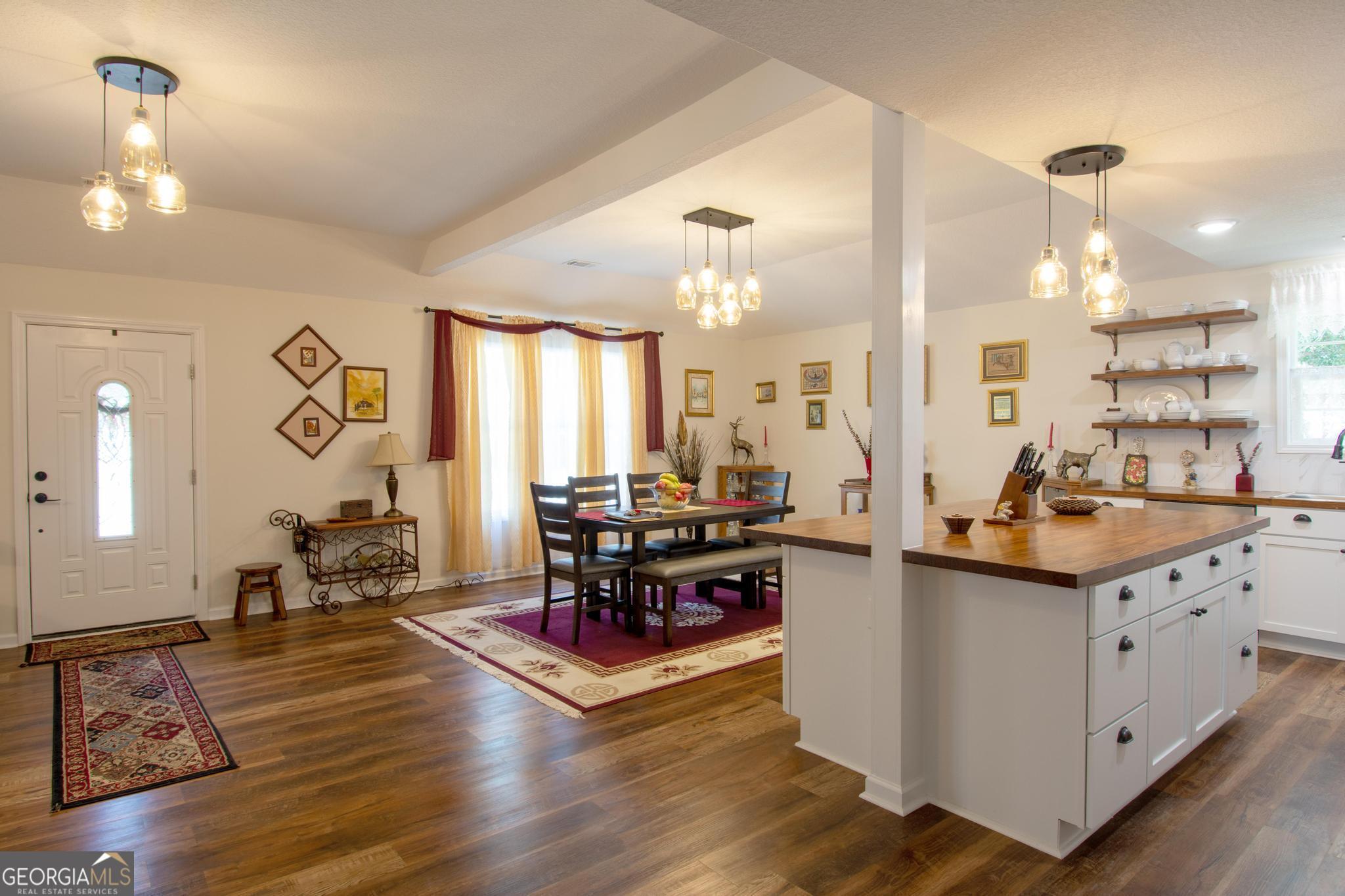 149 Main Street Rocky Ford, GA 30455 - Photo 9 of 44 a living room with furniture and wooden floor