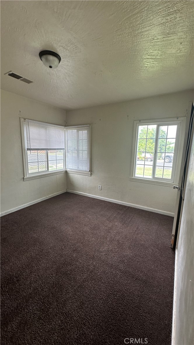 1888 Orchard Lane Merced, CA 95340 - Photo 12 of 28 an empty room with windows