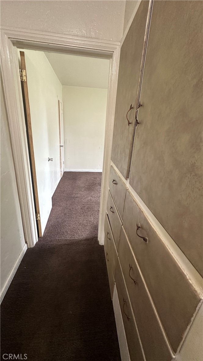 1888 Orchard Lane Merced, CA 95340 - Photo 13 of 28 a view of a closet with wooden floor