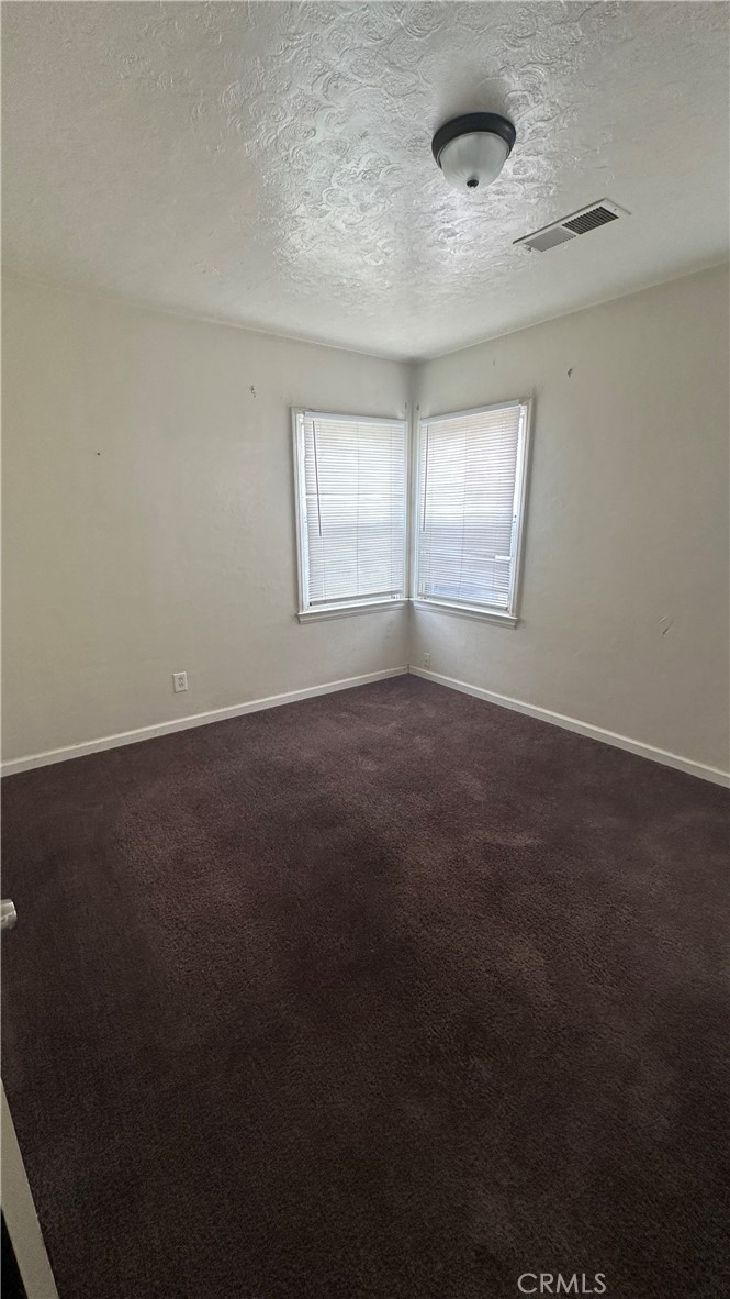 1888 Orchard Lane Merced, CA 95340 - Photo 10 of 28 an empty room with windows