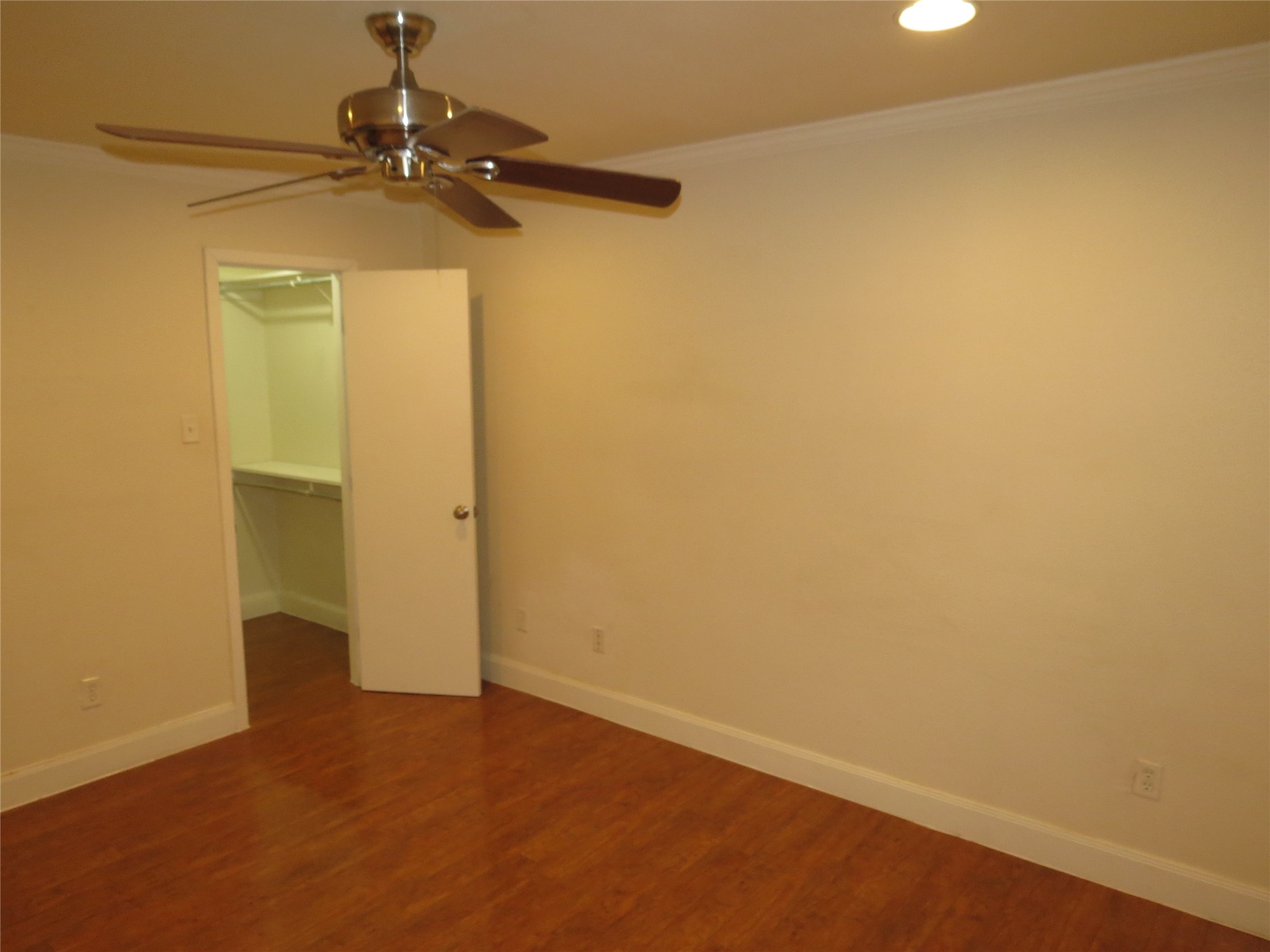4159 Steck Avenue, Unit 269 Austin, TX 78759 - Photo 12 of 21 Lustrous hardwood flooring stretches throughout this serene bedroom, offering both comfort and practicality.