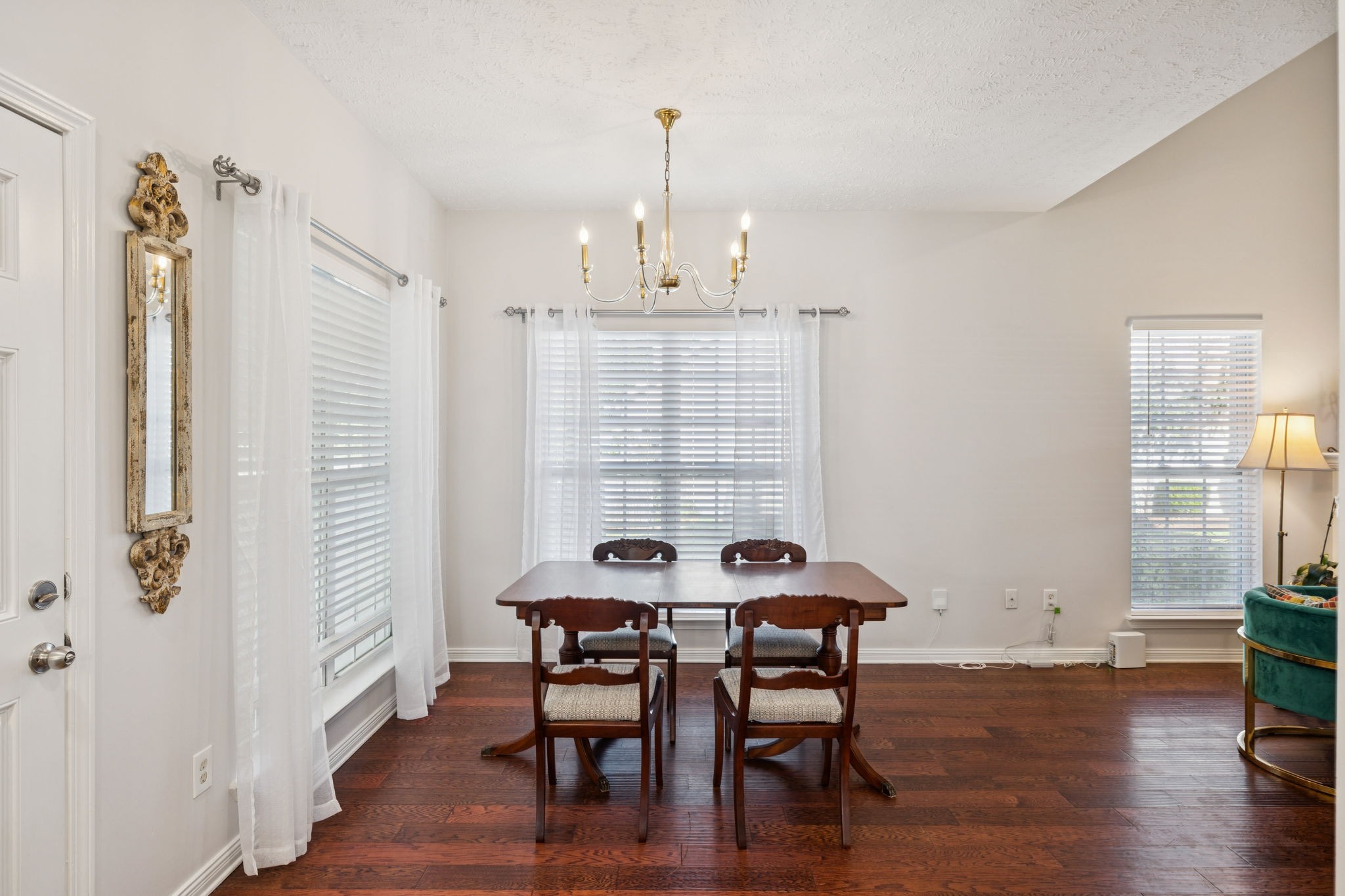 423 Knob Court Franklin, TN 37064 - Photo 19 of 37 a view of a dining room with furniture window and wooden floor