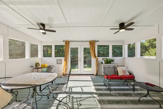 a room with furniture and window