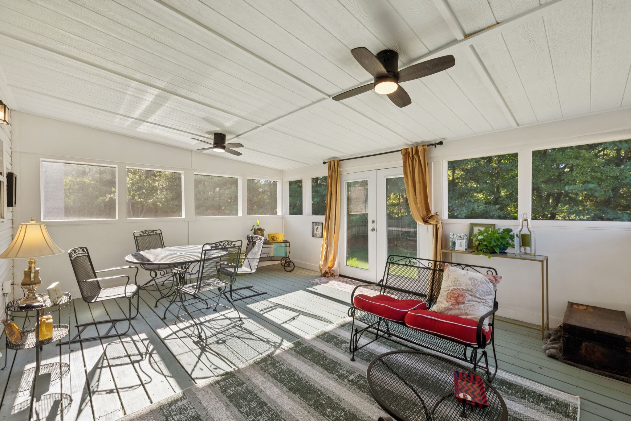 423 Knob Court Franklin, TN 37064 - Photo 23 of 37 a living room with furniture a floor to ceiling window and a table