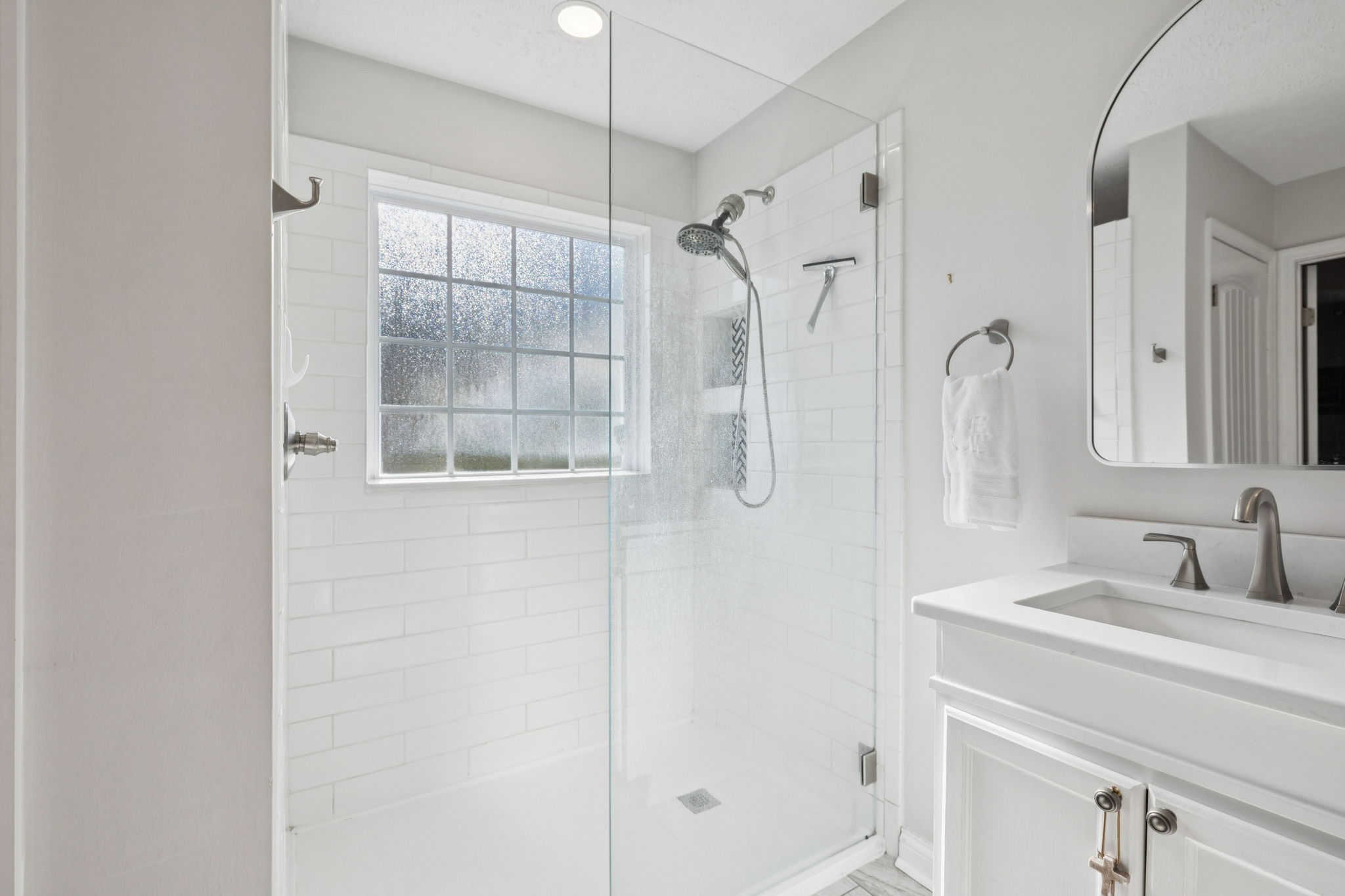 423 Knob Court Franklin, TN 37064 - Photo 28 of 37 a bathroom with a shower and a sink