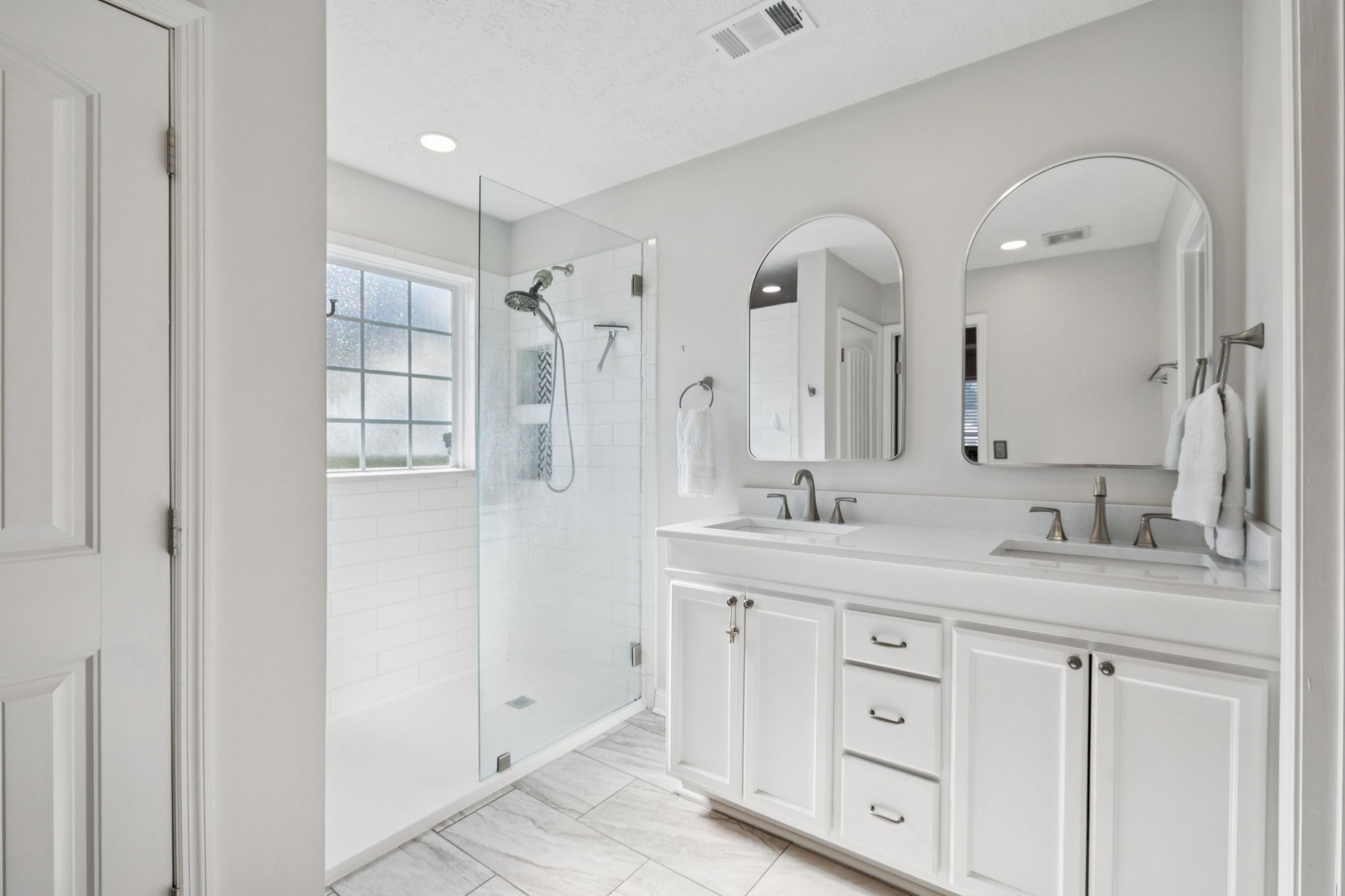 423 Knob Court Franklin, TN 37064 - Photo 29 of 37 a bathroom with a double vanity sink and mirror
