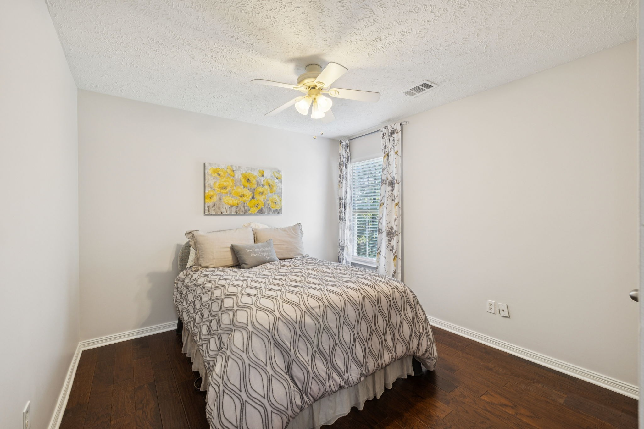 423 Knob Court Franklin, TN 37064 - Photo 33 of 37 a bedroom with a bed and a chandelier