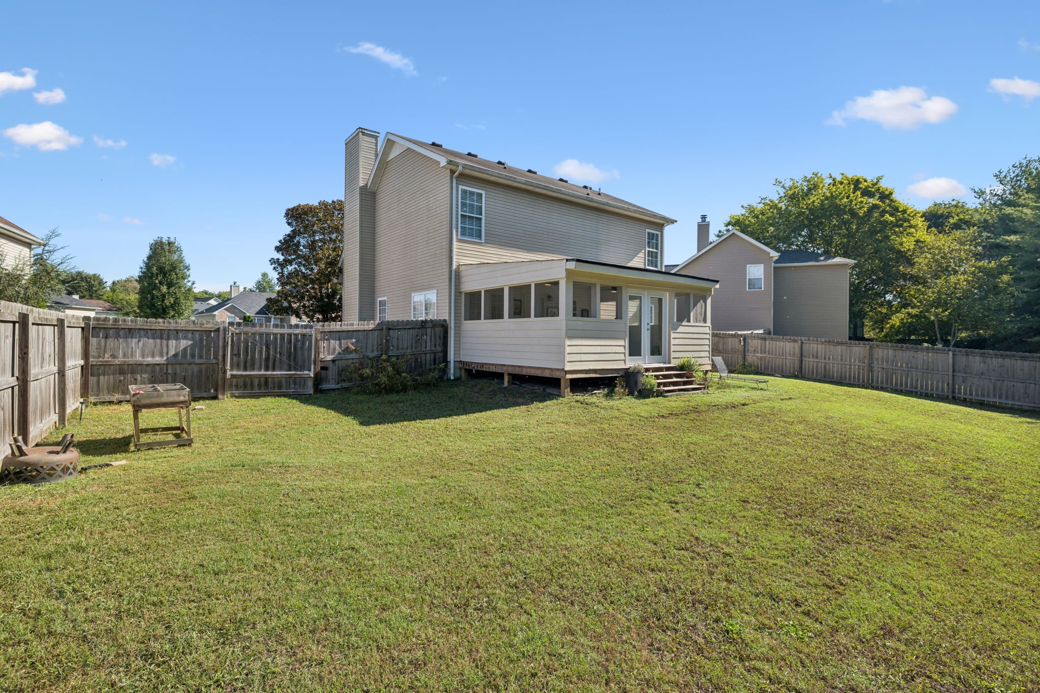 423 Knob Court Franklin, TN 37064 - Photo 36 of 37 a house view with swimming pool and trees in the background