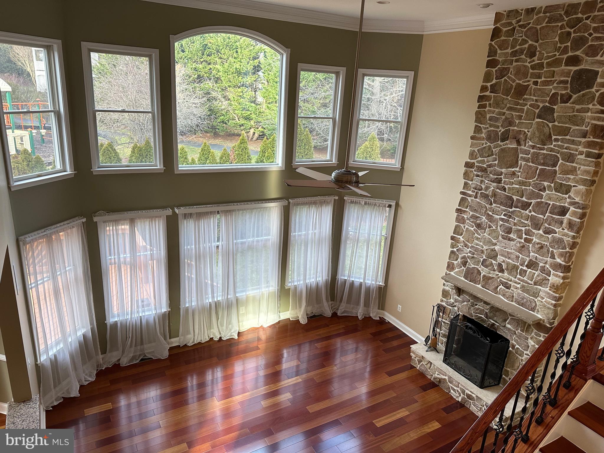 3215 Spring Rain Court Herndon, VA 20171 - Photo 12 of 39 an empty room with wooden floor and windows
