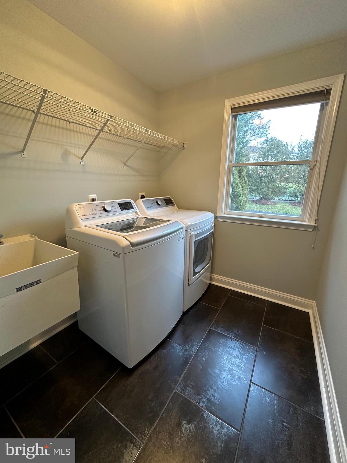 3215 Spring Rain Court Herndon, VA 20171 - Photo 16 of 39 a utility room with dryer and washer