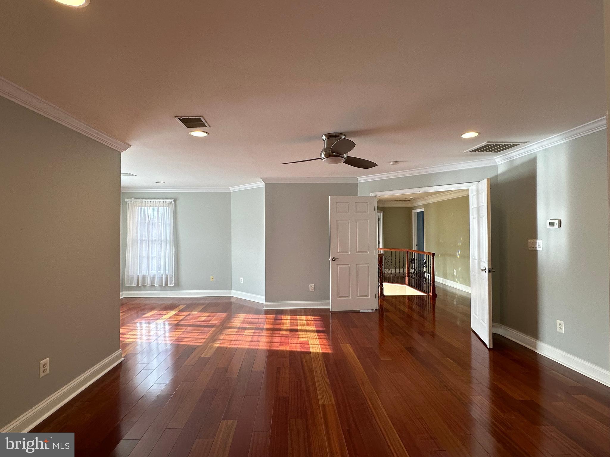 3215 Spring Rain Court Herndon, VA 20171 - Photo 20 of 39 a view of empty room with wooden floor and fan