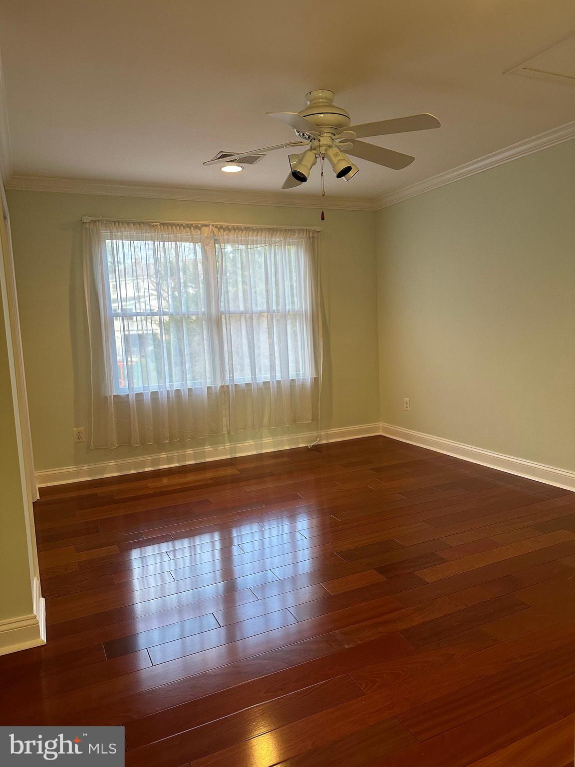 3215 Spring Rain Court Herndon, VA 20171 - Photo 24 of 39 a view of empty room with wooden floor and fan