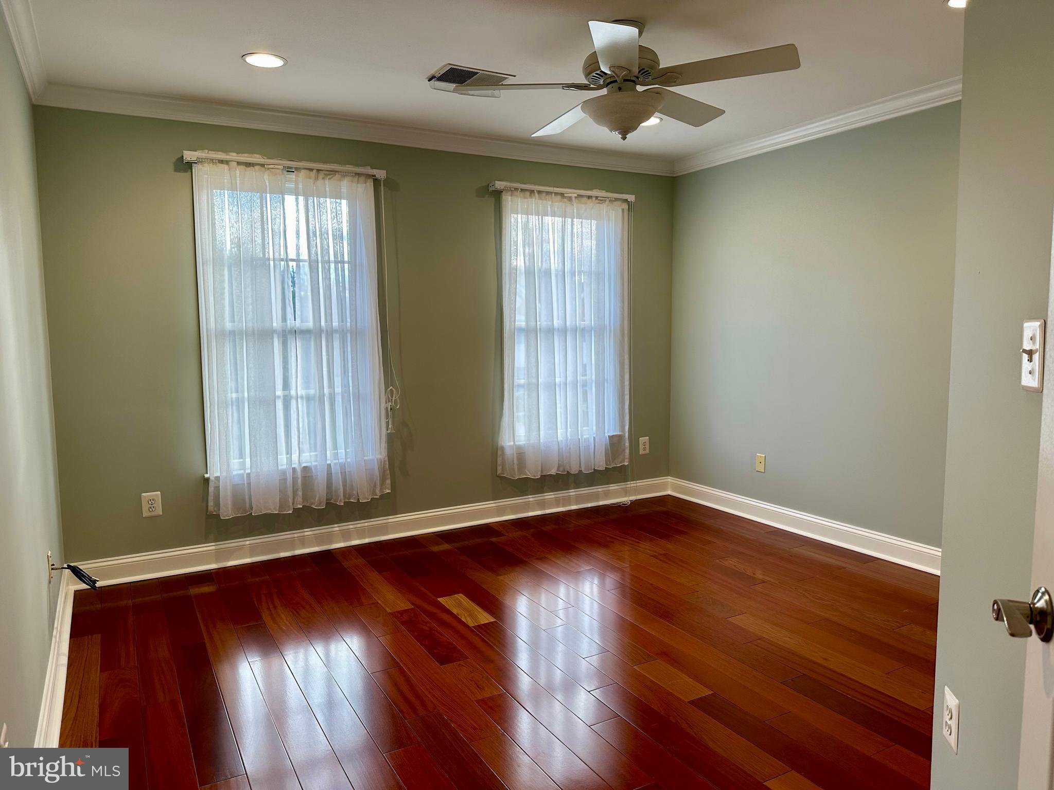 3215 Spring Rain Court Herndon, VA 20171 - Photo 27 of 39 wooden floor in an empty room with a window