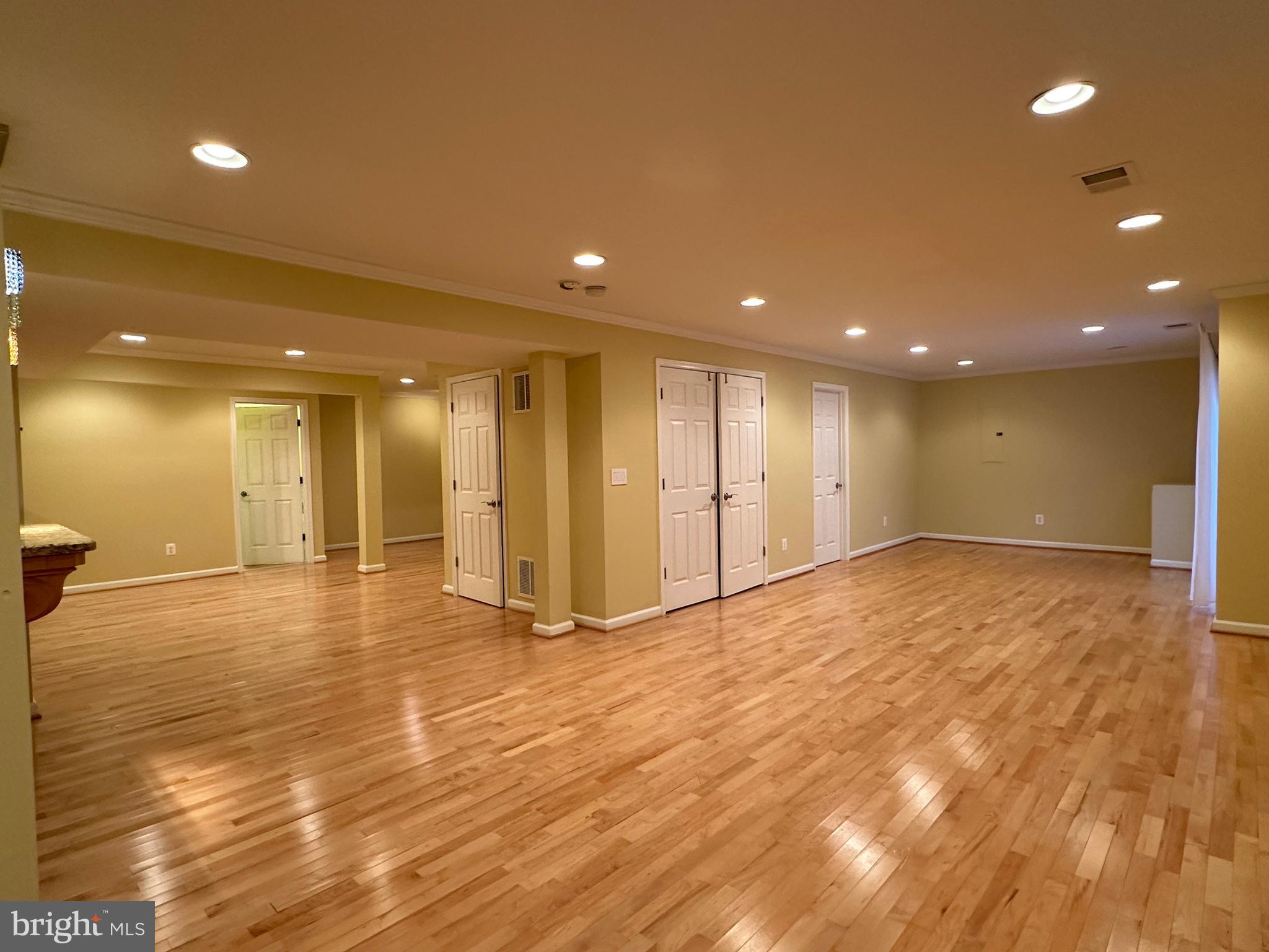 3215 Spring Rain Court Herndon, VA 20171 - Photo 29 of 39 a view of an empty room with wooden floor