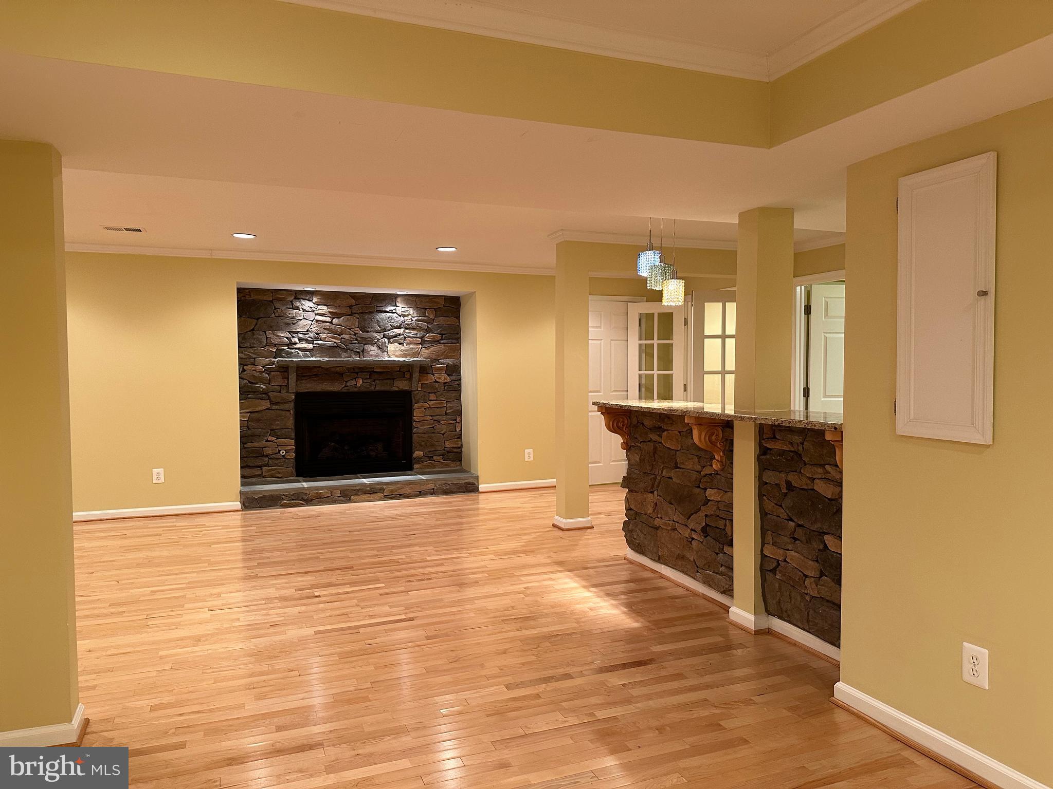 3215 Spring Rain Court Herndon, VA 20171 - Photo 32 of 39 a view of an empty room and a kitchen