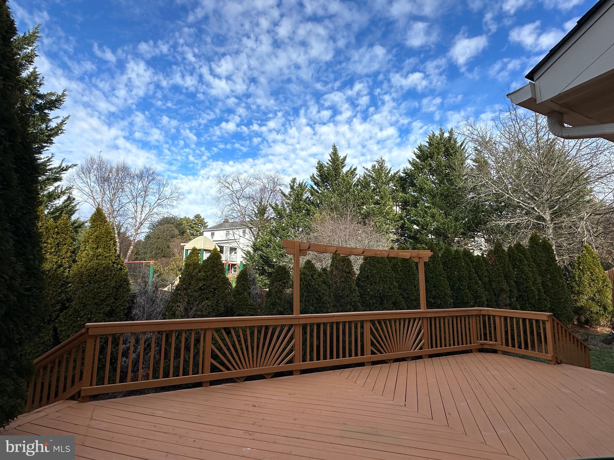 3215 Spring Rain Court Herndon, VA 20171 - Photo 39 of 39 a view of balcony with wooden floor and fence