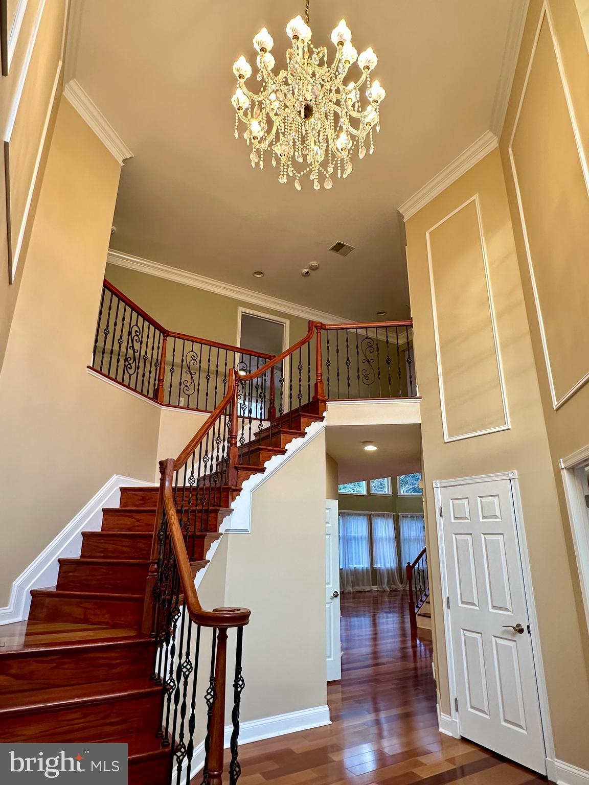 3215 Spring Rain Court Herndon, VA 20171 - Photo 4 of 39 a view of entryway and hall with wooden floor
