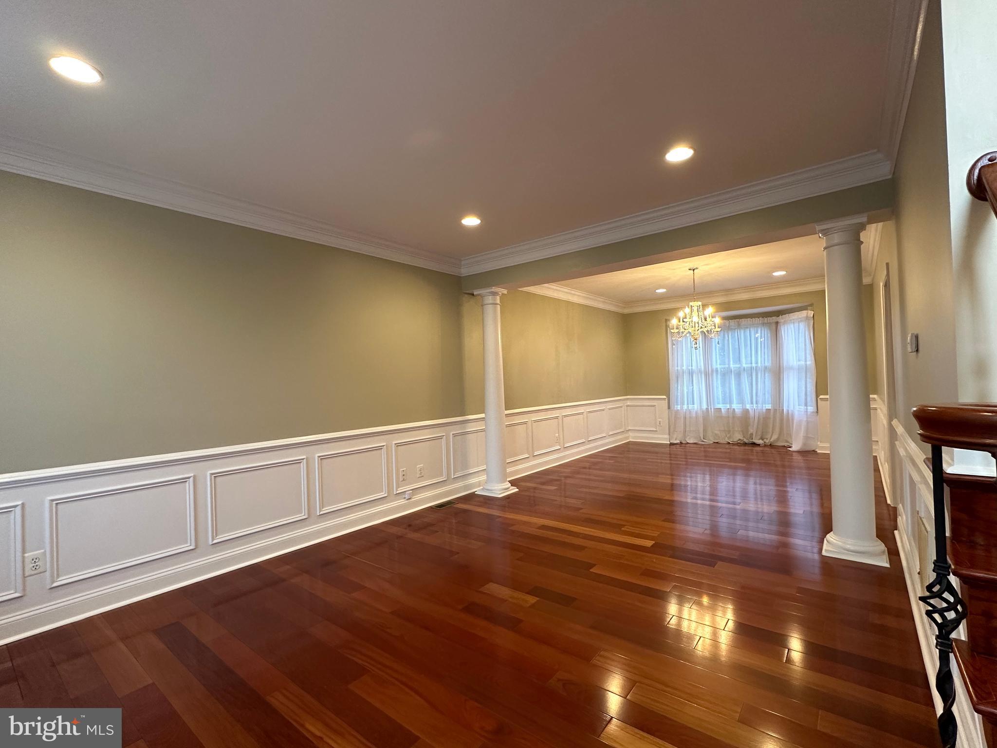 3215 Spring Rain Court Herndon, VA 20171 - Photo 6 of 39 a view of an empty room with wooden floor