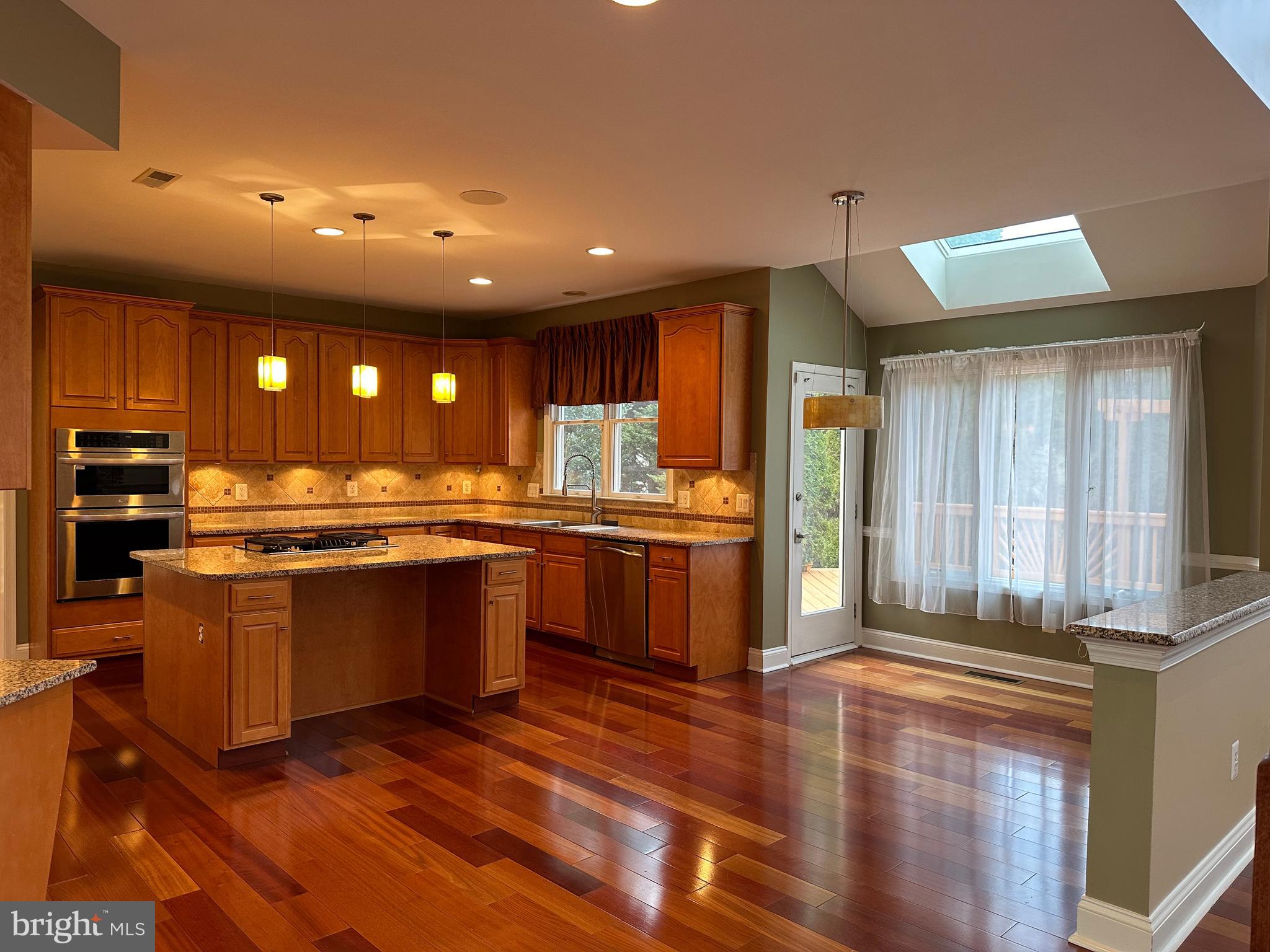 3215 Spring Rain Court Herndon, VA 20171 - Photo 8 of 39 a large kitchen with lots of counter space