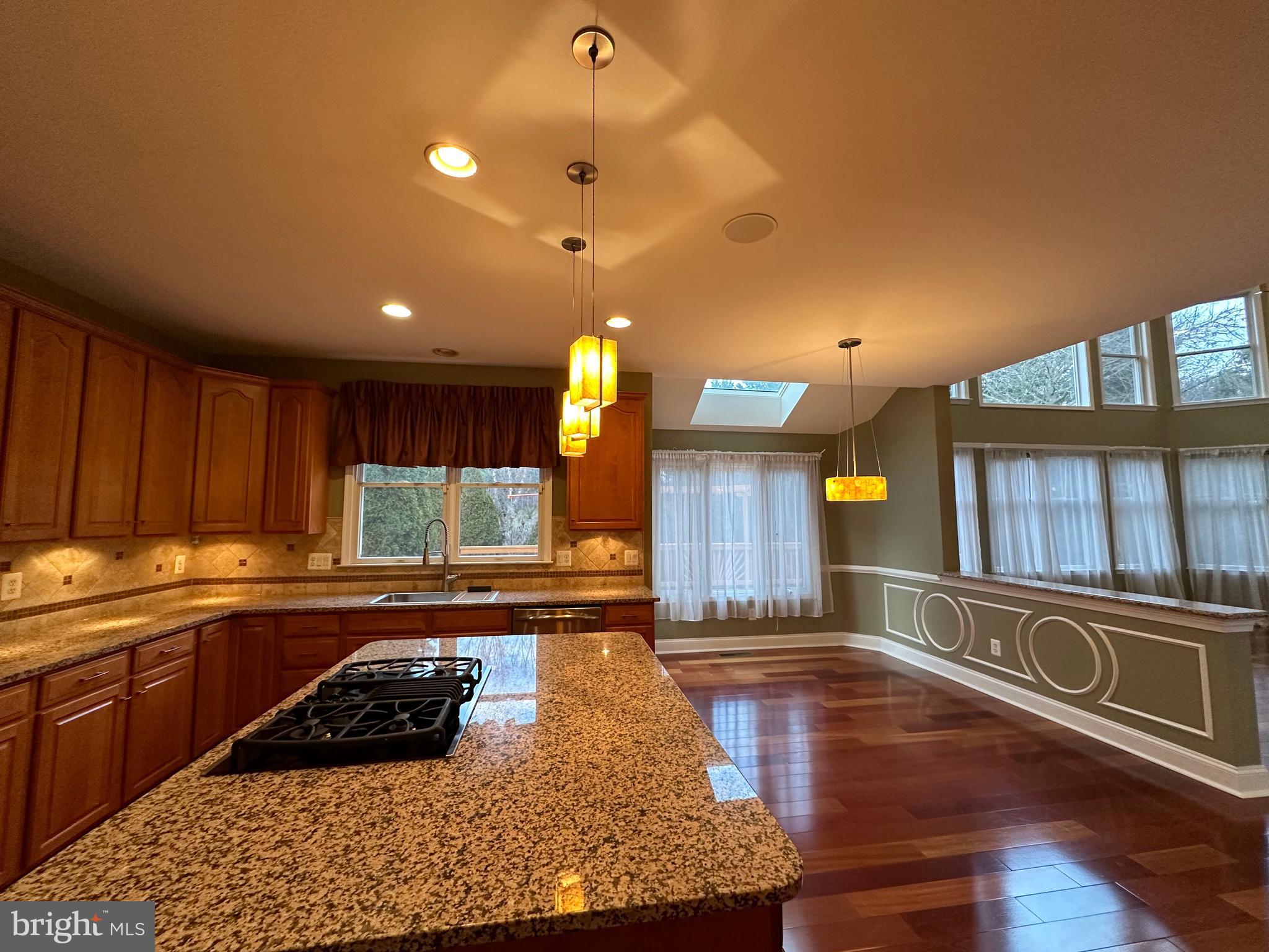 3215 Spring Rain Court Herndon, VA 20171 - Photo 10 of 39 a kitchen with lots of counter top space and appliances
