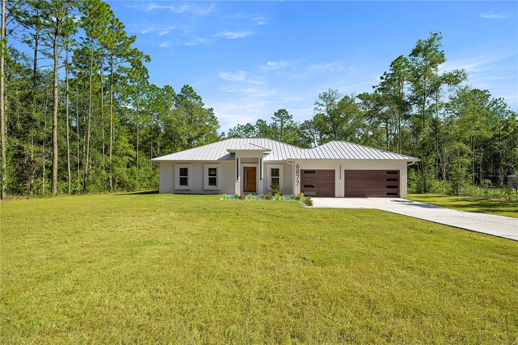 6877 Southwest 131st Circle Ocala, FL 34481 - Photo 2 of 54