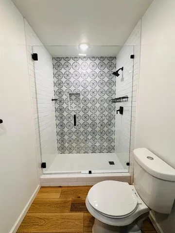 a room with a sink and a mirror