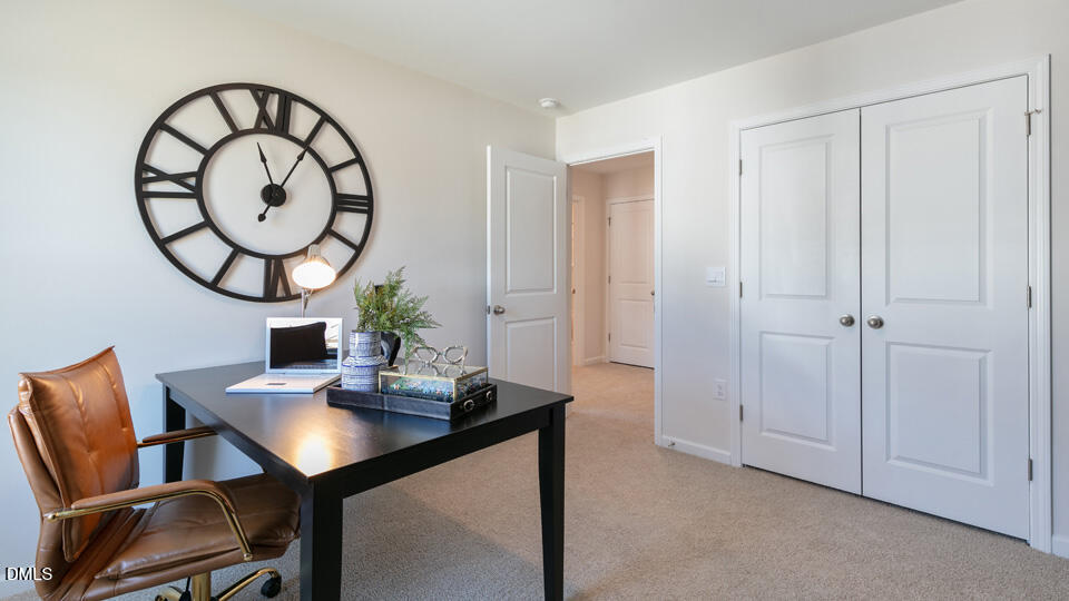 922 Sculptor Street Wendell, NC 27591 - Photo 25 of 51 a view of a workspace with furniture