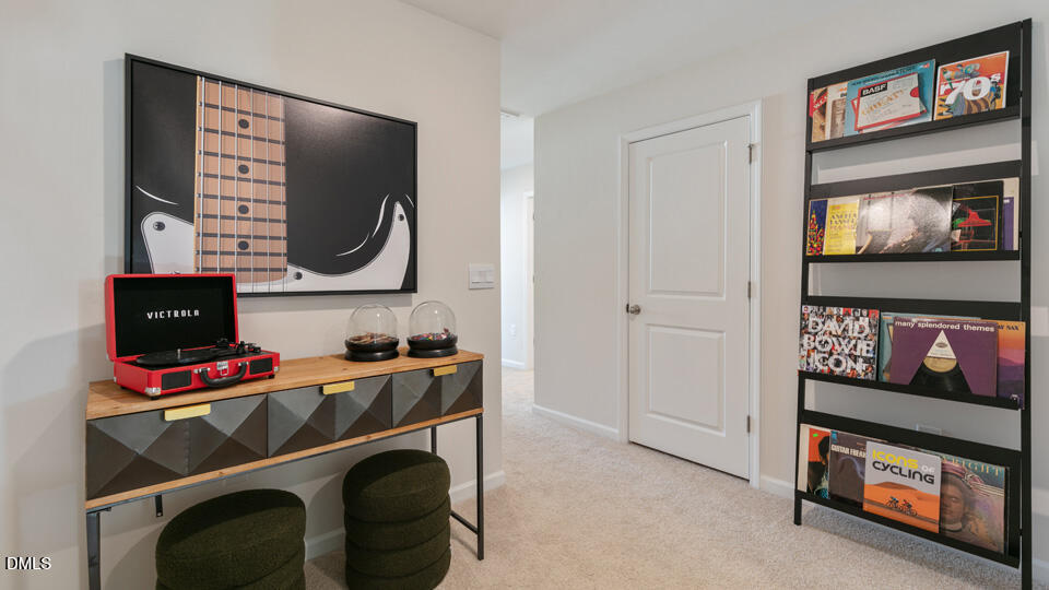 922 Sculptor Street Wendell, NC 27591 - Photo 29 of 51 a room with furniture and a flat screen tv