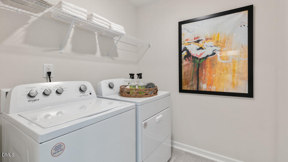 922 Sculptor Street Wendell, NC 27591 - Photo 31 of 51 a utility room with dryer and washer