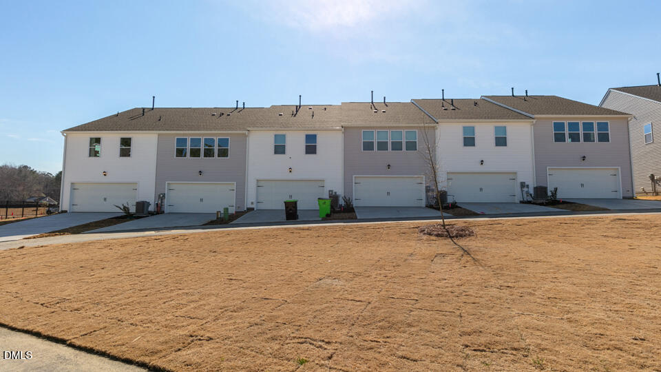 922 Sculptor Street Wendell, NC 27591 - Photo 36 of 51 a view of a house with a yard