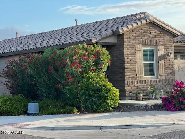 a view of a house in a yard