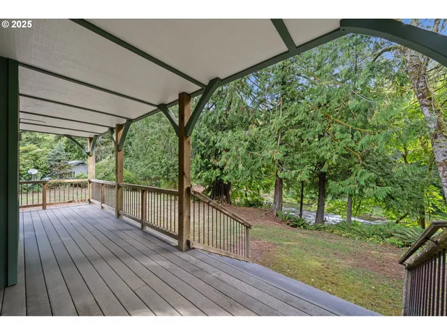 a view of porch with wooden floor