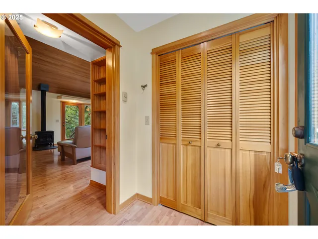 a view of a living room and a large window