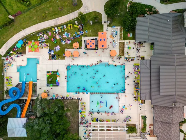 a front view of a building with garden