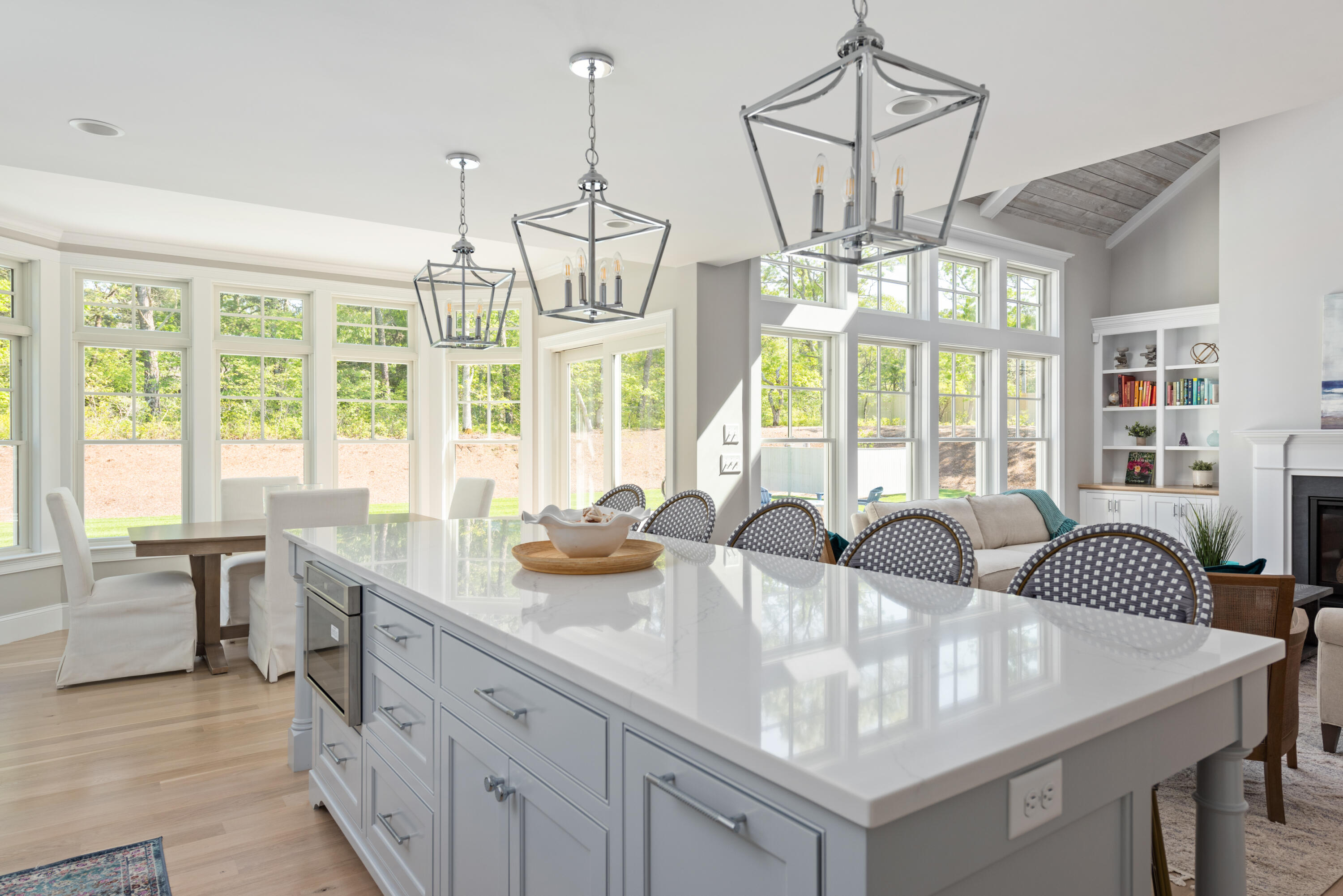 3 Elijah's Wds Harwich, MA 02645 - Photo 15 of 43 a view of a dining room and livingroom with furniture wooden floor a chandelier