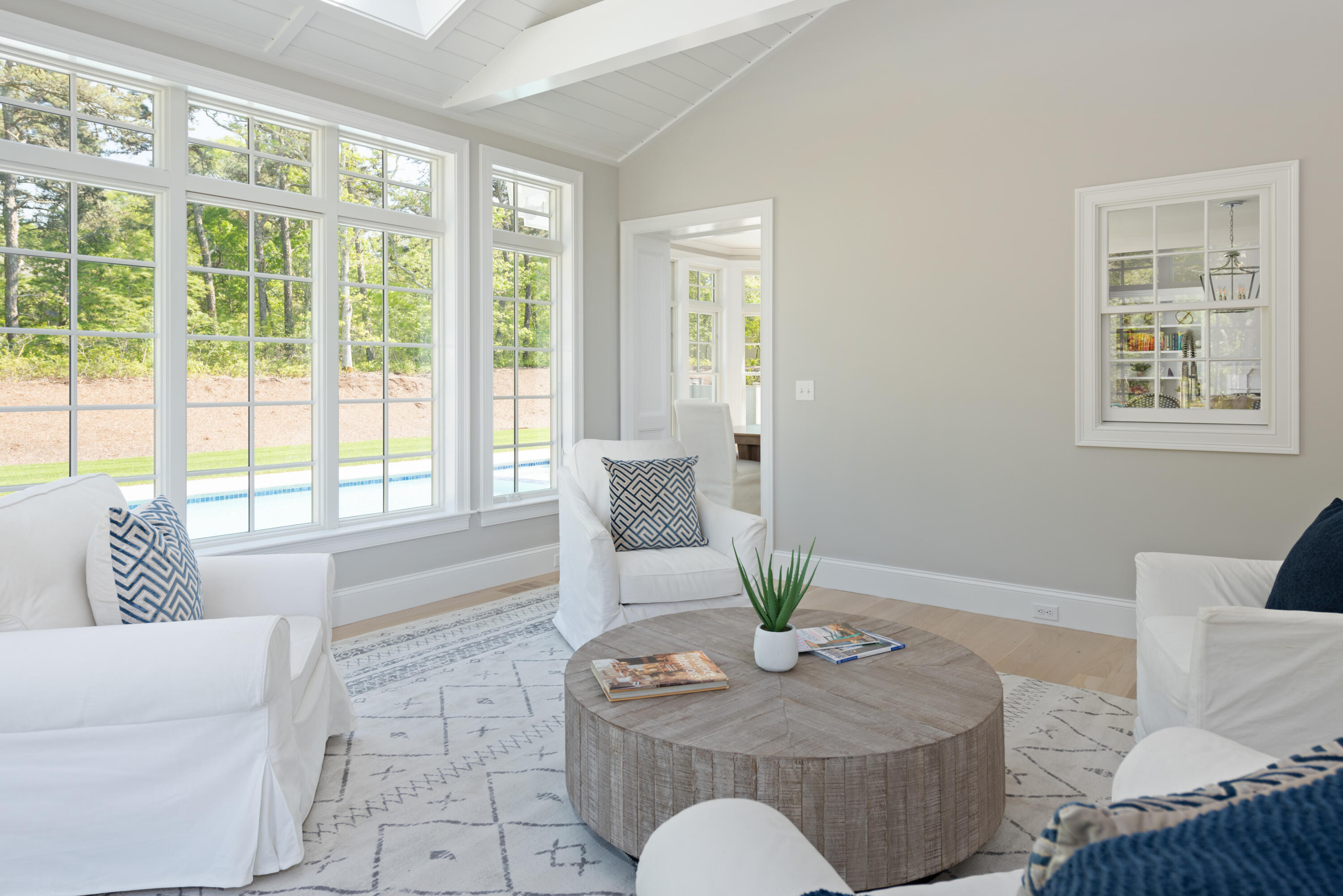 3 Elijah's Wds Harwich, MA 02645 - Photo 16 of 43 a living room with furniture and floor to ceiling windows