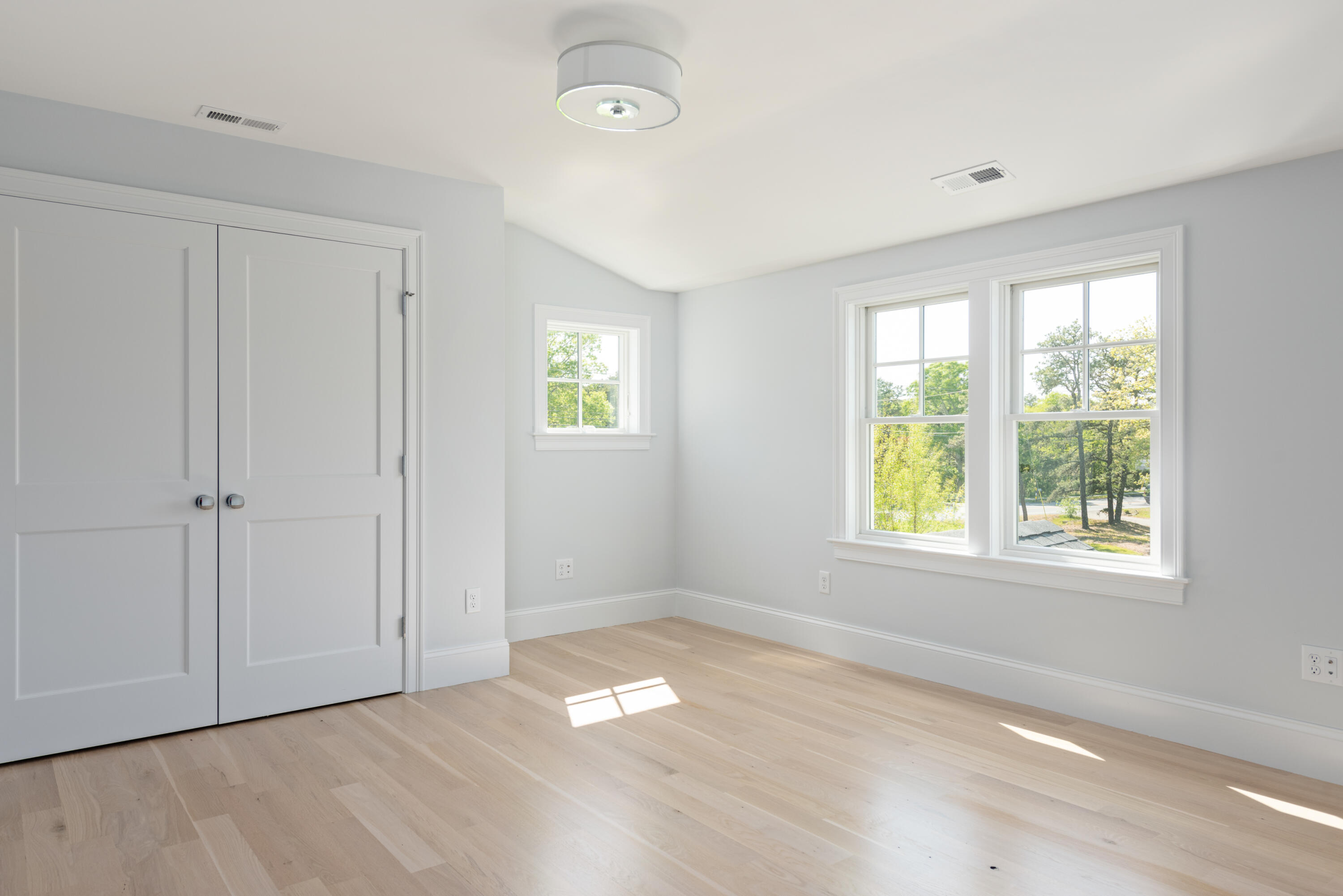 3 Elijah's Wds Harwich, MA 02645 - Photo 29 of 43 a view of empty room with window and wooden floor