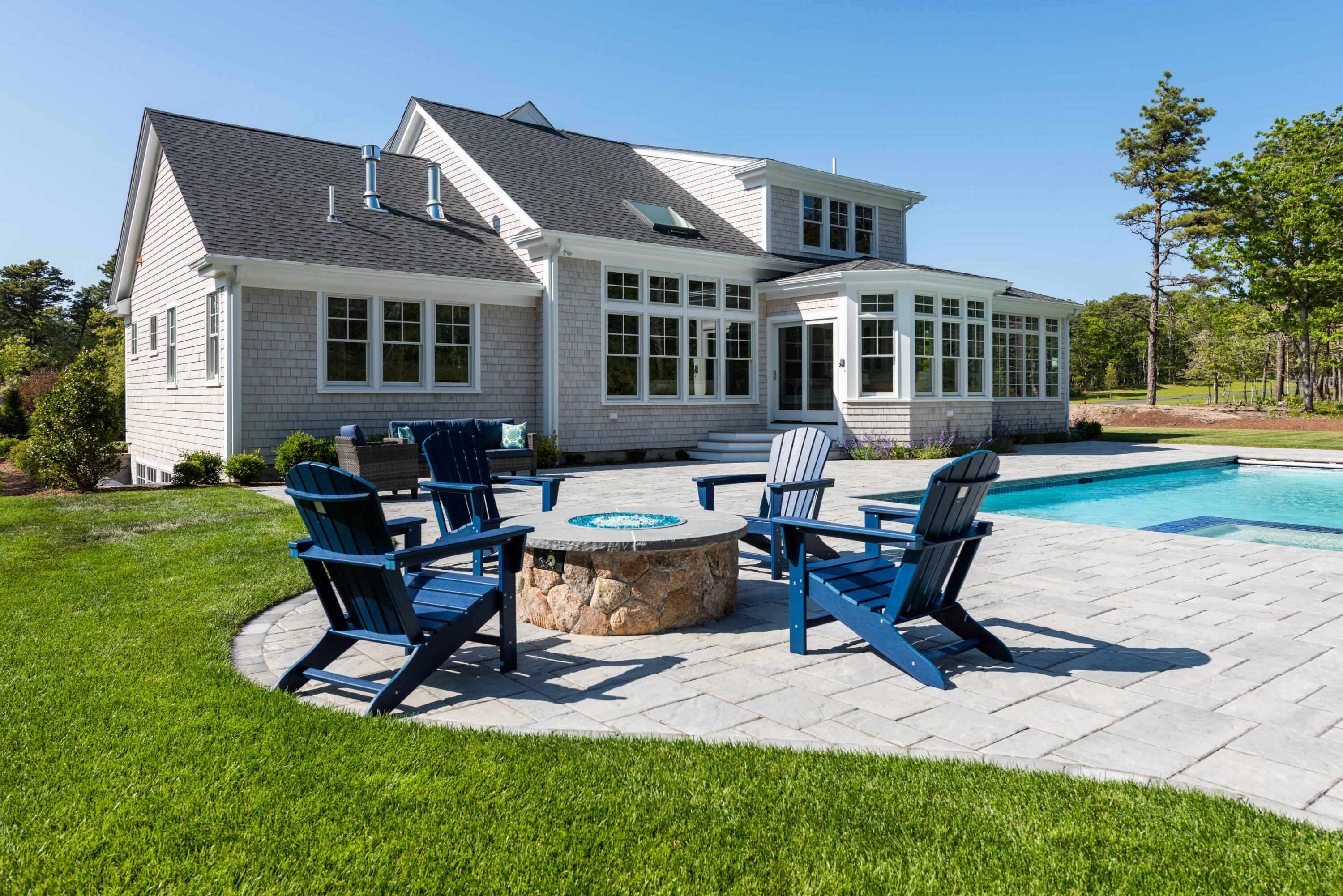 3 Elijah's Wds Harwich, MA 02645 - Photo 3 of 43 a building outdoor space with patio furniture and garden