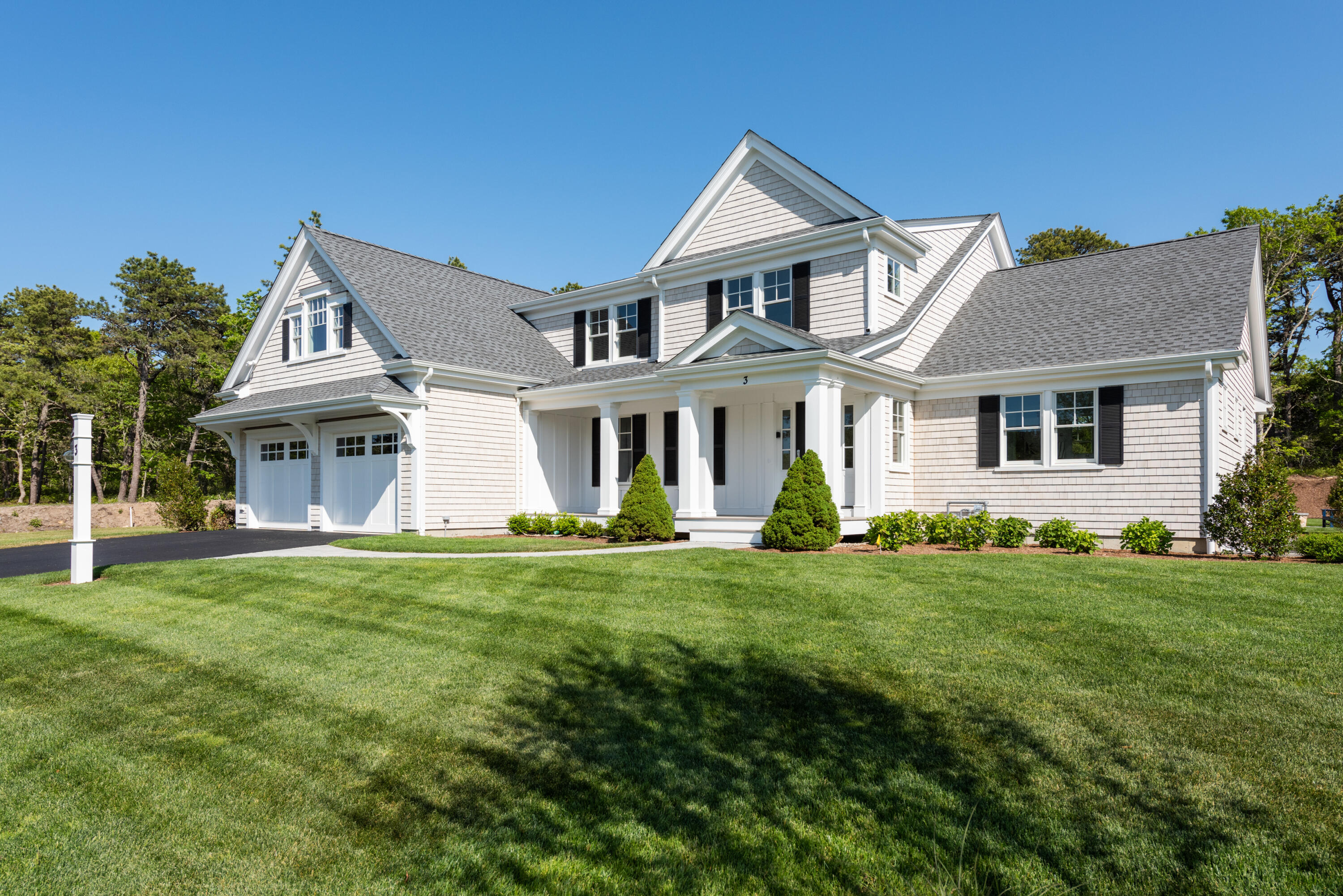 3 Elijah's Wds Harwich, MA 02645 - Photo 34 of 43 front view of a house with a garden