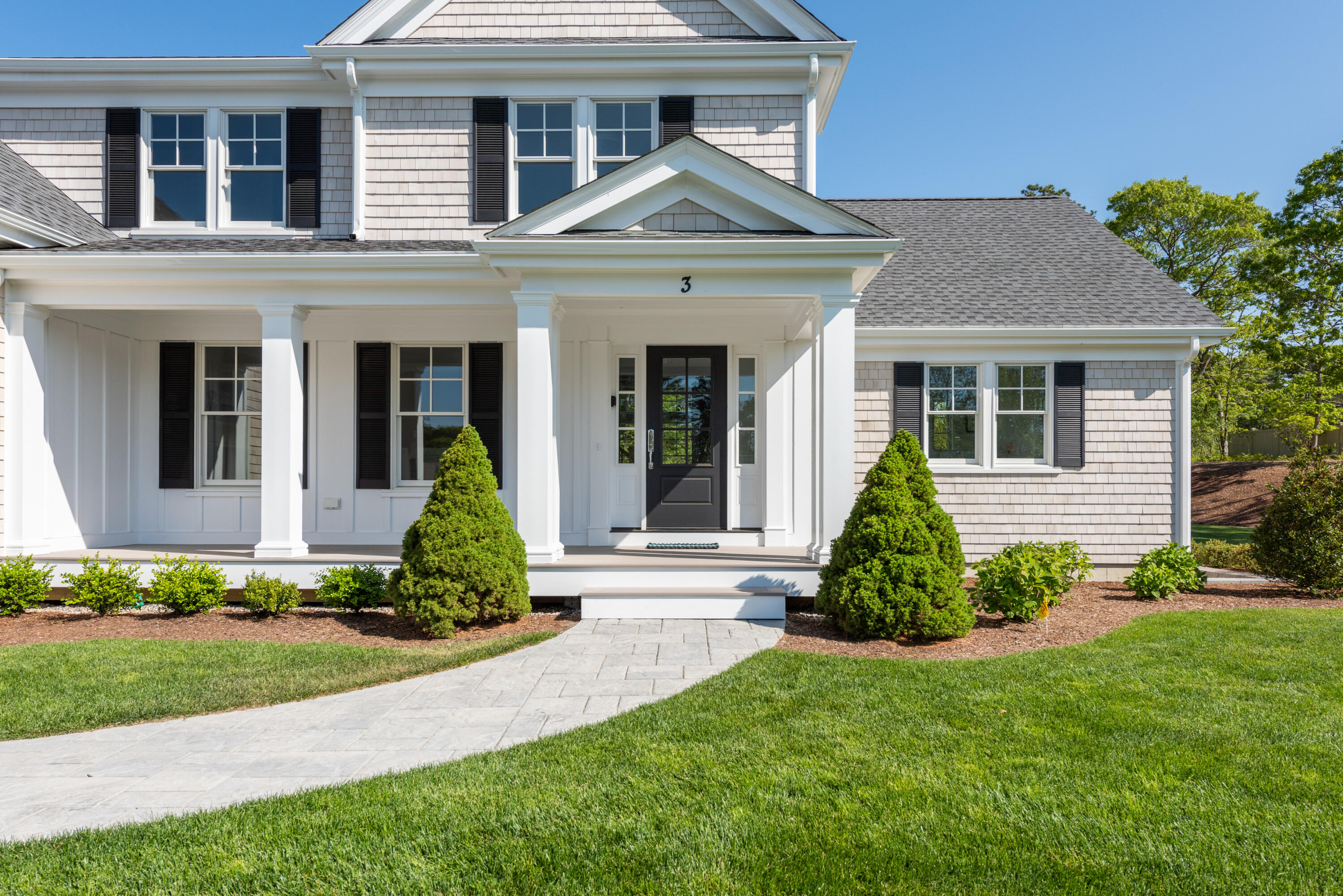 3 Elijah's Wds Harwich, MA 02645 - Photo 5 of 43 a front view of a house with a yard