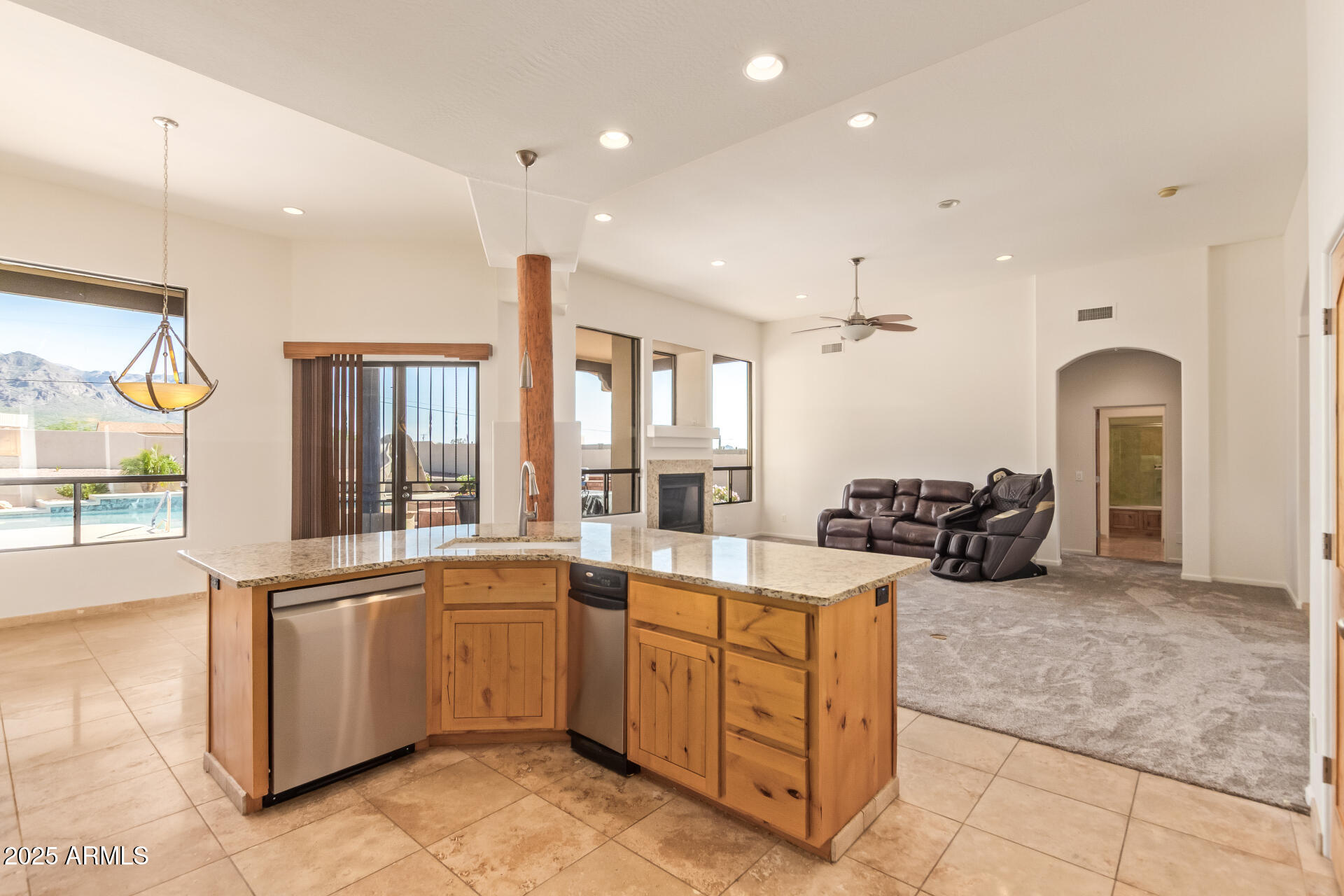 945 North Mountain View Road Apache Junction, AZ 85119 - Photo 17 of 53 a large white kitchen with a large window
